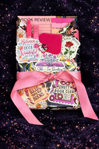 Beautiful book wrapped in cheerful colors and adorned with goodies.