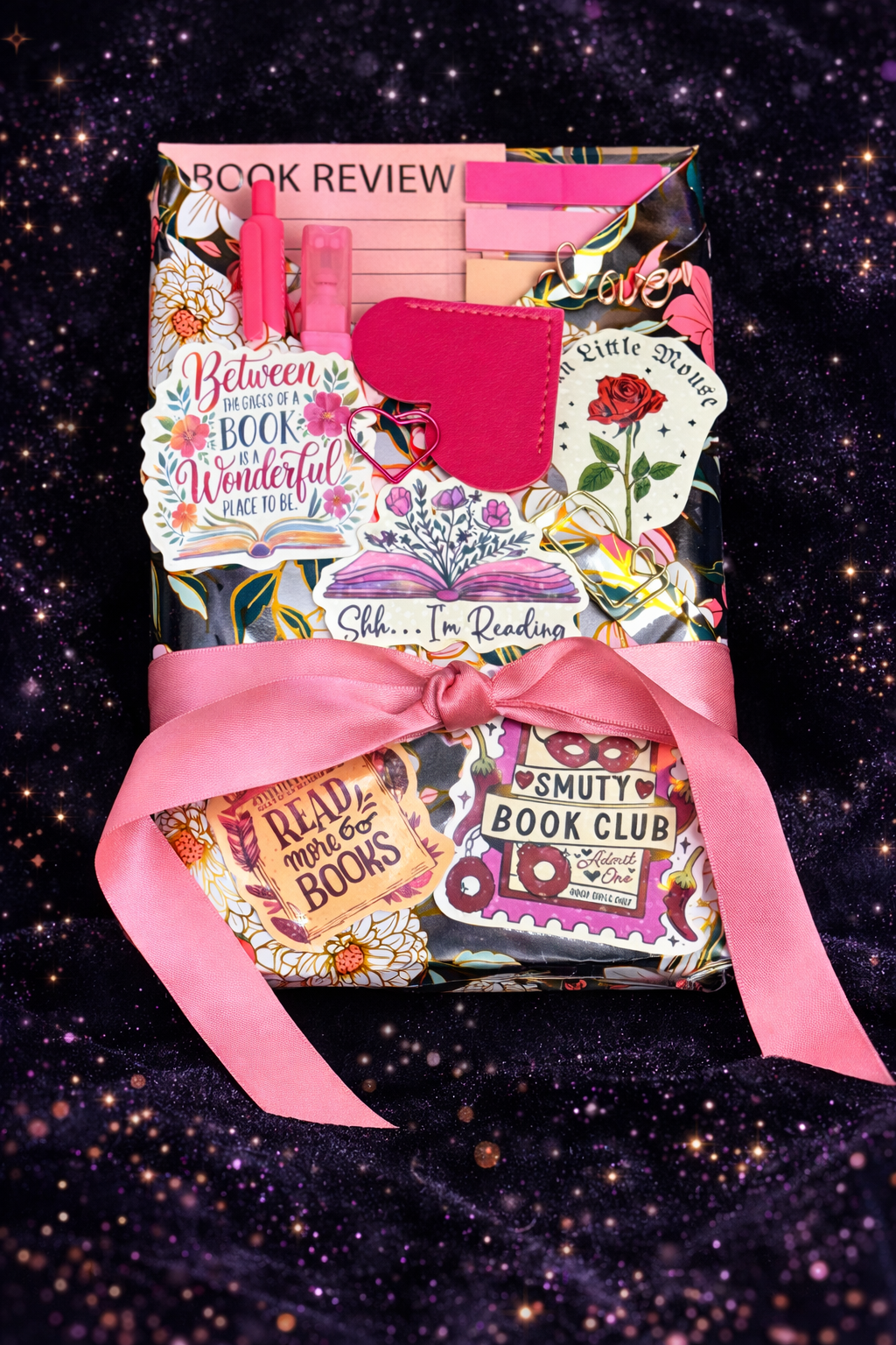 Beautiful book wrapped in cheerful colors and adorned with goodies.