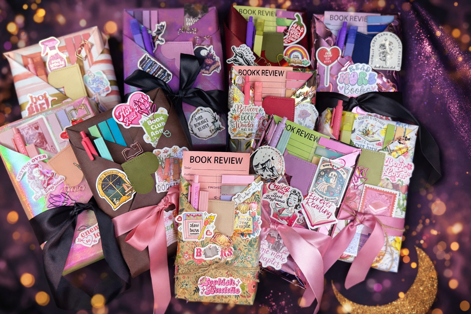 Collection of colorful book review boxes with decorative elements on a dark background